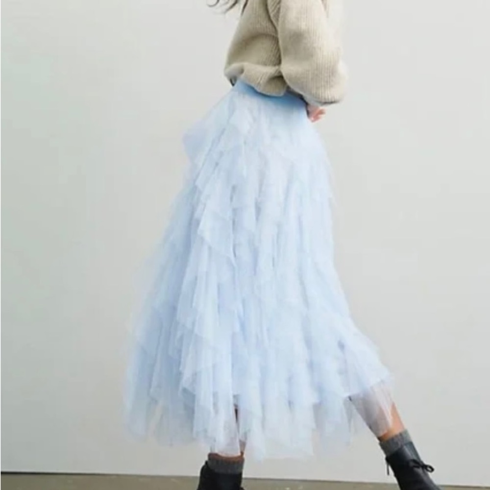Light blue skirt.